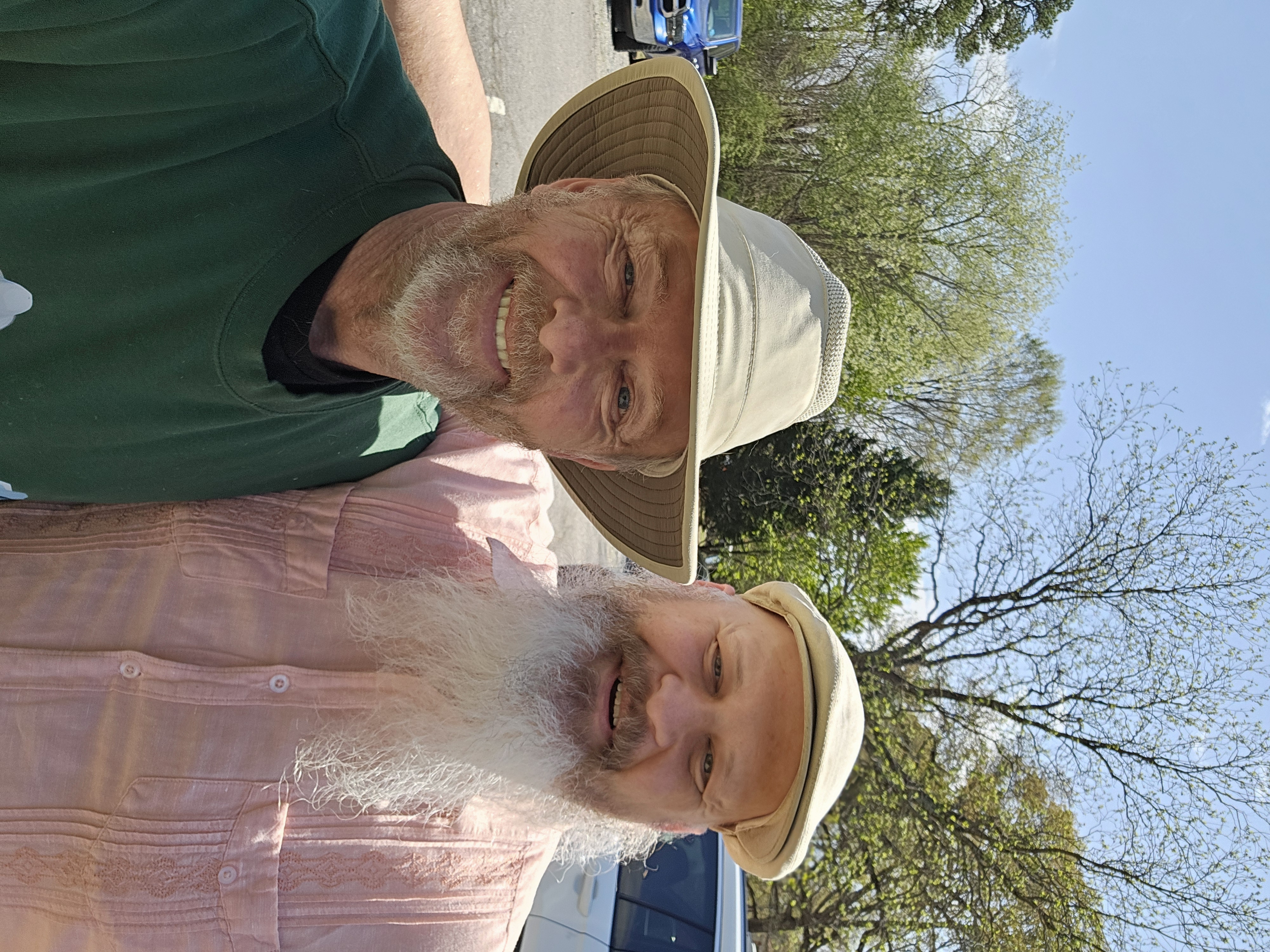 Robert with a friend from his prison ministry visits — bonds built through service and love.